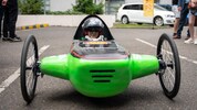 Shell go kart on track.