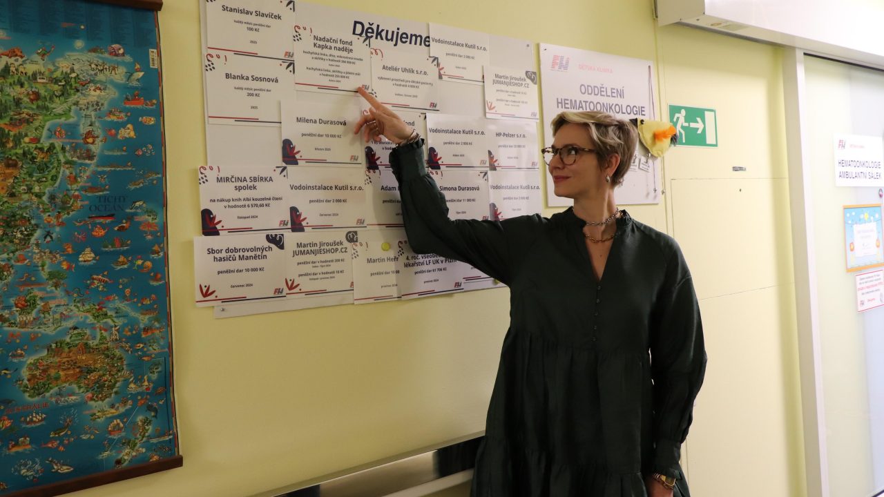 Woman pointing on board information