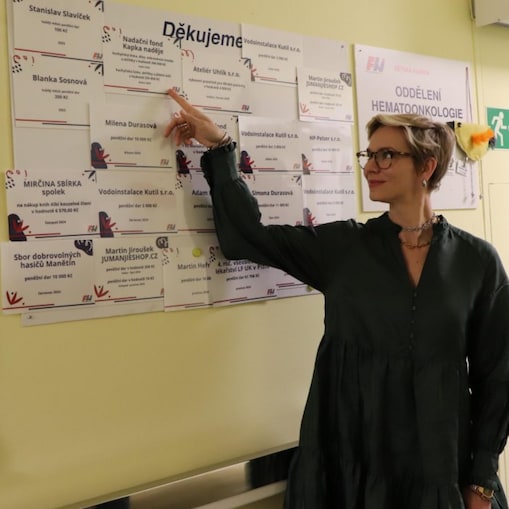 Woman pointing on board information