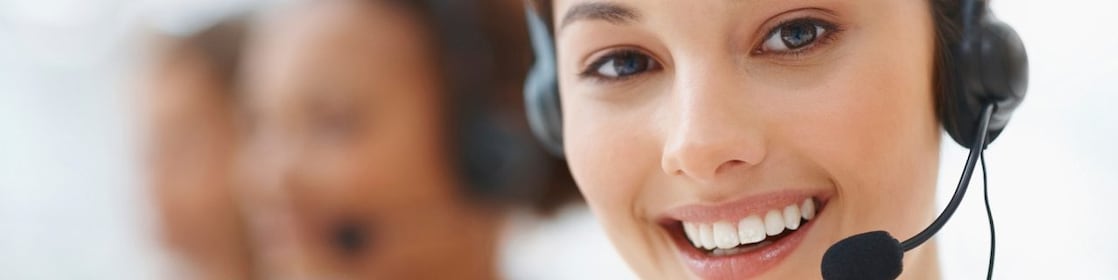Customer support employee smiling