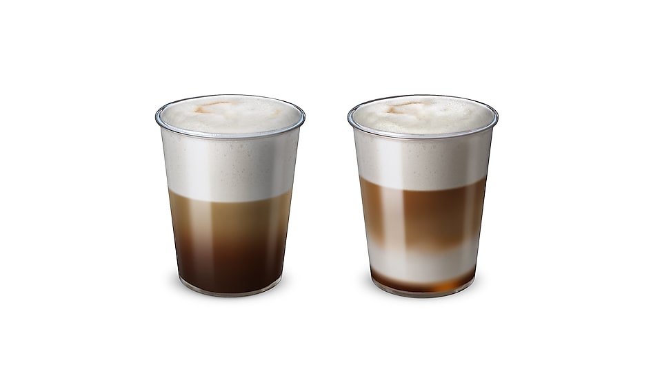 Dva hrnky s kávou Cappuccino Irish Coffee a Latte Macchiato s příchutí